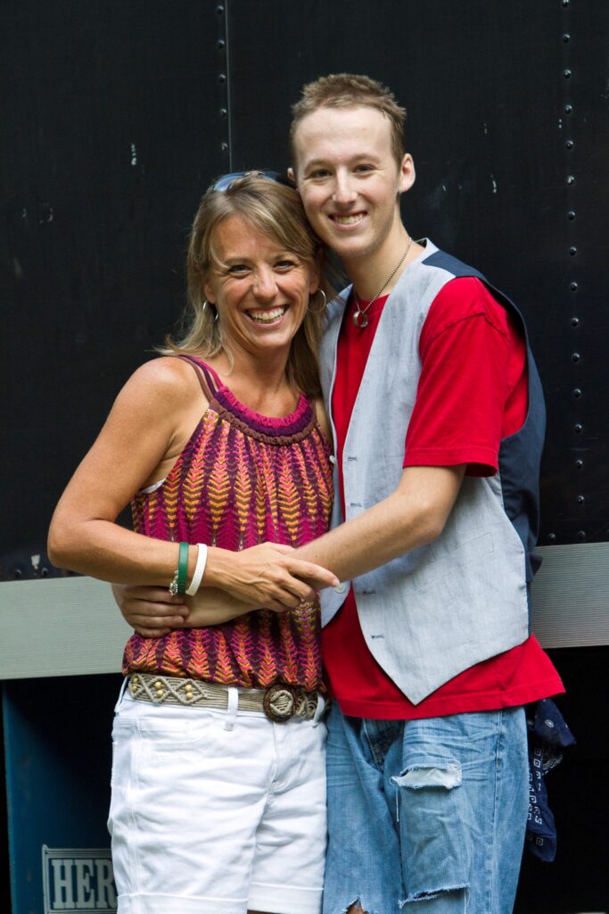 Photo of Carson Sumpter hugging his mom, Kim.